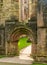 Entrance arch to Fountains Abbey ruins in Yorkshire, England