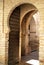 Entrance arches to the mosque mezquita within the castle, Jerez de la Frontera, Spain.