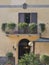 Entrance and balcony of ancient manor in Tuscany