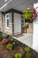 Entrance of brand new townhome decorated with flowers.