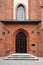 Entrance of building with beautiful arched wooden door