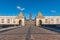 Entrance of Christiansborg Palace under a blue sky on a sunny day