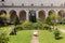 The entrance cloister of Monte Cassino Abbey and the death of Saint Benedict Statue. Italy