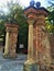 Entrance and columns of Govone castle`s garden, Piedmont region, Italy. Art, architecture, history and urban design