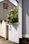 Entrance with container and flowers in a wood house at Porvoo Finland