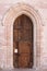 Entrance door of St. Claire Cathedral in Assisi