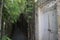 Entrance door to a villa in Bali with bamboos pathway