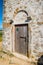 Entrance door of very old catholic church of St. Nicolas in Nin in Croatia near Zadar