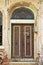 Entrance door of a very old house abandoned in Buyukada, Istanbul