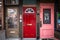 Entrance doors of a shared individual wooden house in the residential district of the Glebe, a convenience store can be seen