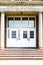 Entrance doors to a typical American school building with steps