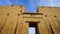 Entrance of Edfu temple of Horus majestic beautiful landmark with ancient blue paint on wall