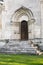 The entrance, framed by an arched perspective portal in the tradition of old Russian architecture.