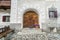 Entrance and fresco of a typical Engadin architecture house in Scuol