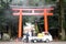 Entrance gate of Kirishima Jingu temple is being cleaned