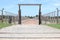 Entrance gate into one block of concentration camp Auschwitz Birkenau