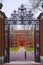 Entrance gate and Sever Hall in Harvard Yard of Cambridge