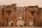 Entrance gate to the Temple of Artemis, Propylaeum of the Sanctuary of Artemis with the modern city of Jerash in the background,