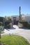 Entrance of luxury villa with tall cactus