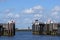 Entrance into the north sea port of cuxhaven in germany with iron gates, which can be closed at Storm surge, sunny blue sky with