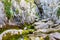 Entrance Panorama of the Source of SoÄa River, Main Pond Cave in Julian Alps. Bovec, Gorizia, Slovenia, Europe