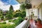 Entrance porch with flower pots overlooking front yard