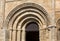Entrance and portal at the Collegiale church of Saint Emilion,