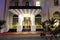 Entrance of the prestigious Hotel Atlantic in Hamburg Germany Europe with pages at night