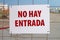 Entrance is prohibited sign in Spanish  Language.