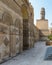 Entrance of public historic Al Hakim Mosque - Enlightened Mosque - and Minaret, Moez Street, Cairo