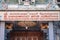 Entrance sign and doorway to the Hindu temple - English Translation Sri Kailawasanathan Swami Devasthanam