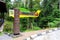 Entrance sign totem with horbill Semenggoh Nature Reserve orangutan sanctuary Kuching Malaysia