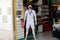 Entrance of a sports store in Portugal with a large Cristiano Ronaldo mannequin with a mask