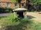 Entrance to an abandoned bomb shelter in the yard. photo