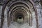 Entrance to abandoned chalk adit. Metal mine roof supports