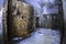 Entrance to the abandoned flooded shelter, with a large, rusty airtight door and peeling paint