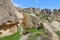 Entrance to the ancient forgotten cave settlement in the mountains of Cappadocia