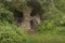 Entrance to the ancient grotto near the medieval castle