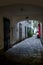 Entrance To The Backyard Of An Old Building With A Picturesque Restaurant In The Inner City Of Vienna In Austria