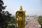 Entrance to Batu Caves with the giant, golden Murugan statue and the 272-step colorful staircase