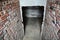 Entrance to the bomb, fallout or storm shelter. Tunnel entrance to a brick basement shelter