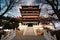 The entrance to the Chinese Buddhist Temple behind the trees in Sanxianshan in Penglai, Yantai, Shandong