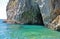 Entrance to the Green grotto with colourful walls and emerald wa