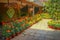 The entrance to a hotel motel surrounded by beautiful flowers kept in vases in Mumbai, India