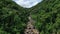 The entrance to Konglor cave in its green mountain