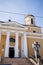 Entrance to a large catholic church with white columns