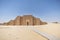 Entrance to the mortuary temple near pyramid of Djoser in Saqqara. Roofed colonnade entrance of Step Pyramid complex, Saqqara