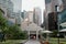 Entrance to MRT Mass Rapid Transit station sitting in the center of Raffles Place, the financial heart of Singapore