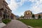 Entrance to Old Church, Alte Kirche, with Graveyard Square and Castle Schenna in the background. Scena, South Tyrol, Italy. Europe