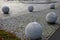 Entrance to the park is secured against the entry of cars by placing concrete balls attached to the paving or asphalt. protection